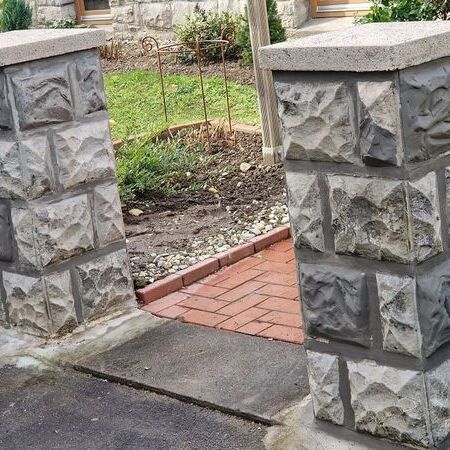 Erneuerte Natursteinmauer: Robuste Begrenzung für Ihren Garten - restauriert